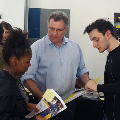 A student considers her options at the Careers in the City fair