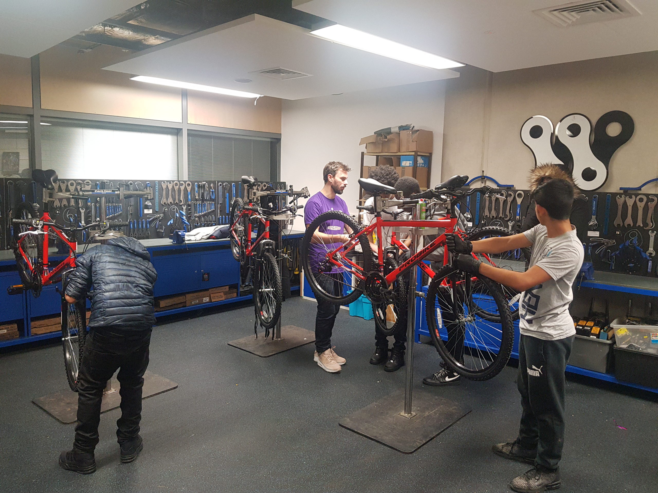 Bike project students with teacher